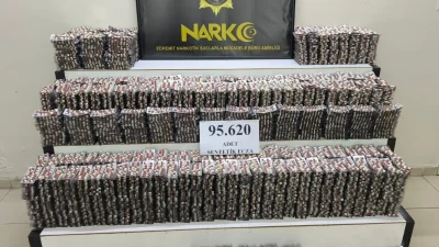 Burhaniye’de durdurulan araçta 95 bin 620 uyuşturucu hap ele geçirildi,